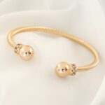 دستبند گوی طلایی استیل - Image 2